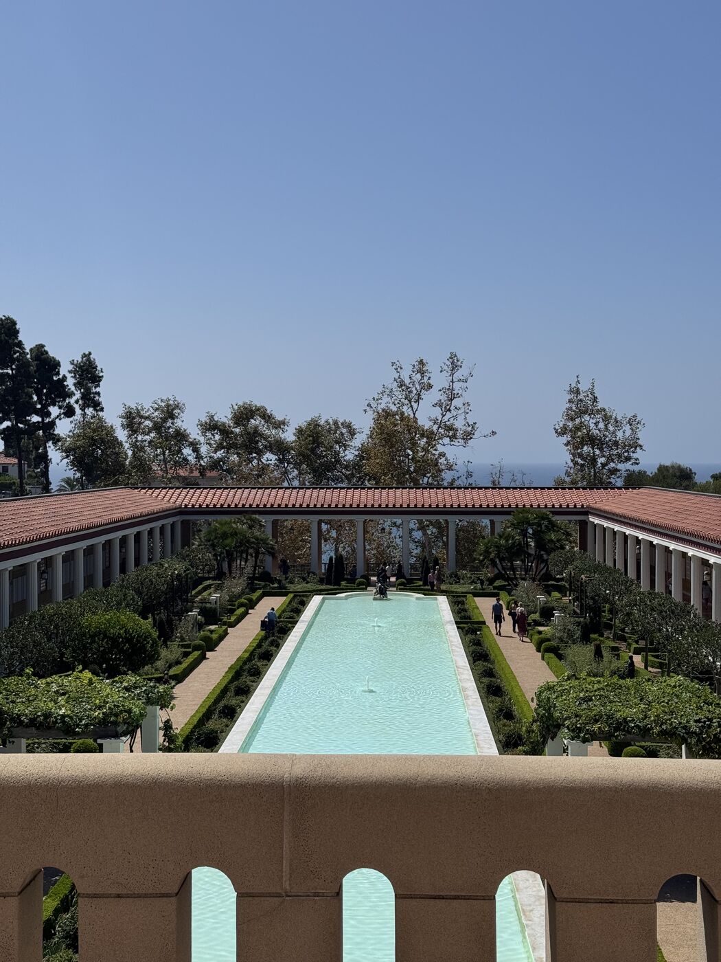 The long reflecting pool and colonnaded garden of the Getty Villa in Pacific Palisades, California